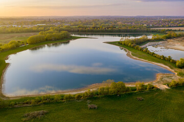 Aerial view of a man made lake in West Oxfordshire