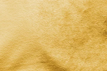 Foto op Plexiglas Gold velvet background or golden yellow velour flannel texture made of cotton or wool with soft fluffy velvety satin fabric cloth metallic color material © Chinnapong