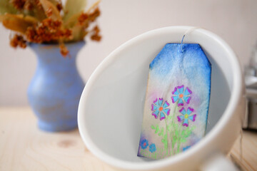 Tea cup, flowers