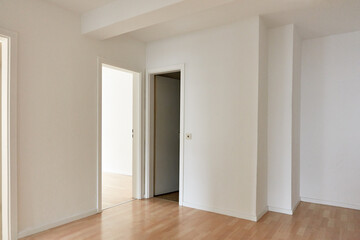 Large hallway as a passage room with doors to the room and toilet