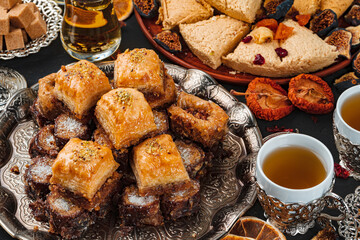 Two cups of coffee with traditional turkish desserts