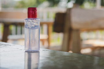 alcohol, antibacterial, antiseptic, apply, beware, bottle, care, careful, clean, clear, closeup, container, corona, coronavirus, covid, covid-19, covid19, dispenser, eating, ethanol, face, gel, hand, 