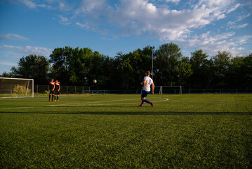 Fototapeta premium Soccer player kicks the ball.Soccer player takes the free-kick.