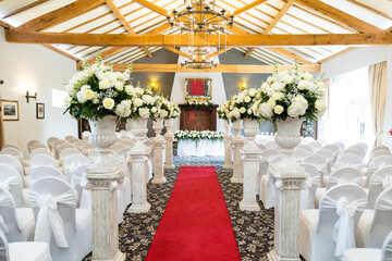 Flowers at a wedding reception, wedding venue, wedding bouquet, white roses, multi colour color...