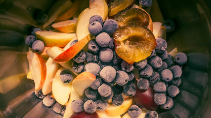 Defrosting fruits in an iron bowl