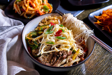 Korean traditional food on table with noodles and meat