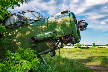 Old aircraft Antonov An-2 at abandoned Airbase aircraft cemetery in Vovchansk, Kharkov region,...