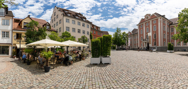 tourists enjoying a day in Meersburg on Lake Constance in the restaurants at the Schlossplatz Square