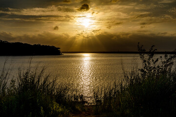 Sahara Dust at Sunset on a lake in Oklahoma.