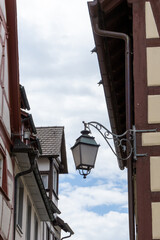 old city lantern and half-timbered houses in Meersburg in southern Germany close up view