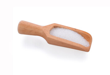 Assortment of beans and lentils in wooden spoon on teak wood background