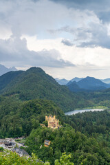 Fototapeta na wymiar view of the southern Bavarian Alps with the Hohenschwangau Castle and Schwansee