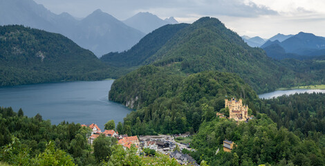 panorama landscape view of Hohenschwangau Castle and Alpsee and Schwansee near Oberschwangau
