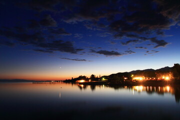 Clouds reflected on the water during sunset