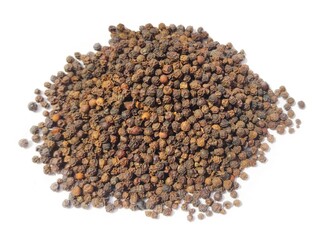 Dry Black peppercorns heap on white background sideview .