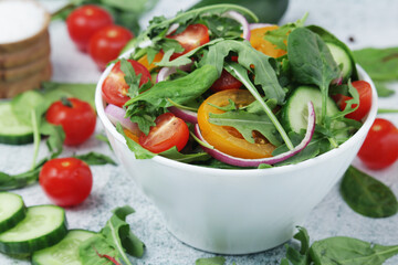 A bowl full of vegetable salad