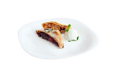 Apple and cherries strudels served with ice cream