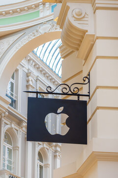 Apple Computer logo hanging above a Mac store front in The Hague on January 15, 2020