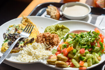 Fitness Breakfast. Herbes And Mushroom Omelette, White Cheese, Fresh Summer Vegetable Salad, Olives, Avocado And Canned Tuna .