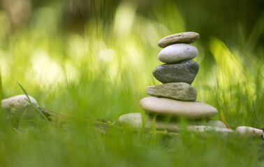 Spirituality: Stone cairn in the park. Balance and relaxation.