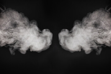 White steam on a black background.