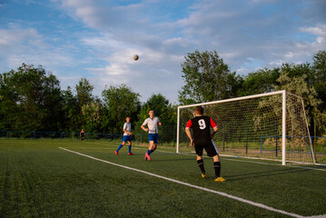 Soccer player kicks the ball.Soccer player takes a corner kick
