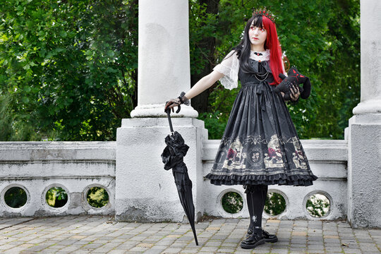 Gothic girl walk in park