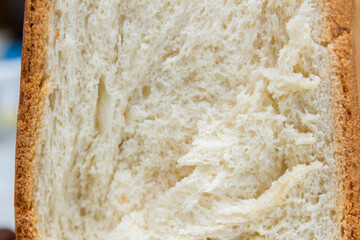 Freshly baked bread was baked at home in a bread maker
