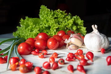 Vegetables and spices on a table with natural light and selected focus