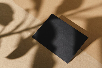 Black business cards on cork board table