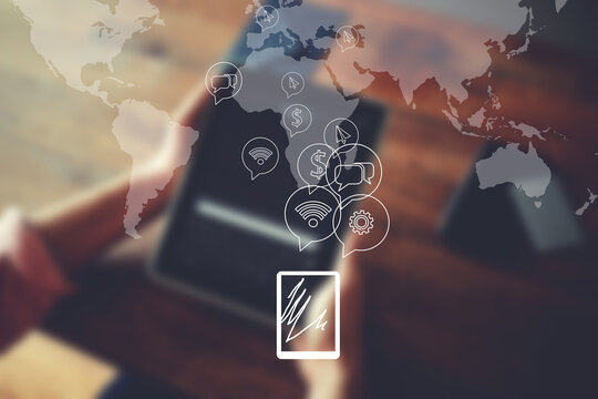 Worldwide map of networking connection in infographic design. Male hands holding digital tablet, business person browsing internet or connecting to wireless via touch pad sitting at wooden table
