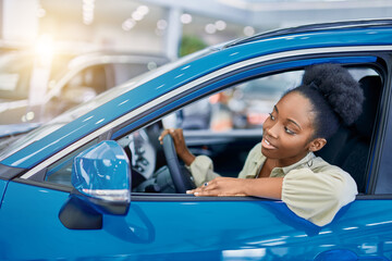 attractive afro woman dreams about new car, young female came to see automobiles, make purchase.