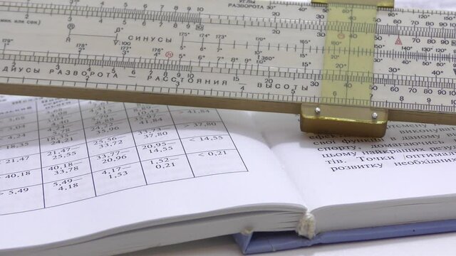 Make calculations on a logarithmic ruler.