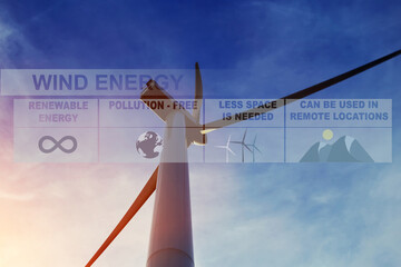 Below view of wind turbine against beautiful cloudy sky and sun rays, electric generator converts...