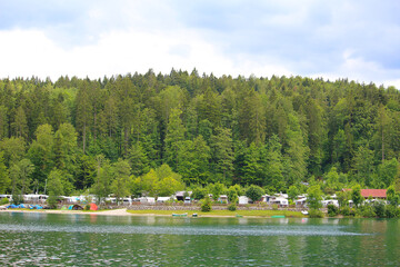 Camp site at a lake and forest (Walchensee, Bavaria, Germany)