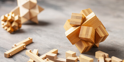 Wooden game block puzzle abstract and components on dark background