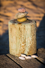 balancing stones on the dock