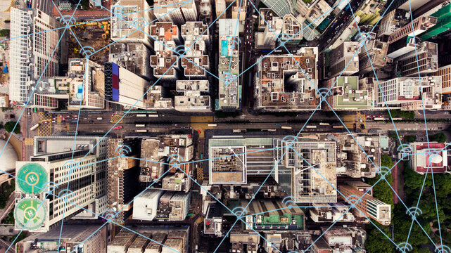 Top view aerial photo of a Hong Kong business center with development infrastructure and tall skyscrapers. Wireless cityscape map with infographics icons, internet and networking connection concept