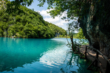 Fototapeta na wymiar Picturesque morning in Plitvice National Park. Colorful spring scene of green forest with pure water lake. Great countryside view of Croatia, Europe