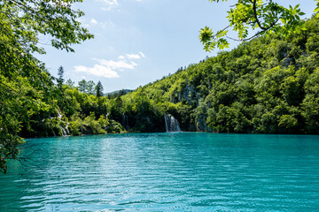 Picturesque morning in Plitvice National Park. Colorful spring scene of green forest with pure water lake. Great countryside view of Croatia, Europe