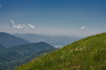 Fototapeta premium the Landscape of Lake Como from an alpine trail in the palanzone peak