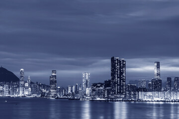 Fototapeta na wymiar Panorama of Skyline of Victoria Harbor of Hong Kong city at dusk