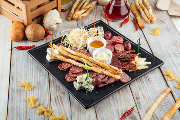 Wine appetizer set smoked sausages cheese honey