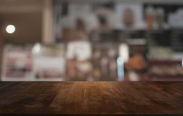 Wood Table Top in Blur Background room interior with empty copy space.