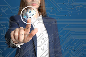 Woman touching icon with digital image of brain on virtual screen, closeup. Machine learning concept