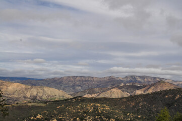 mountain landscape with blue sky and clouds