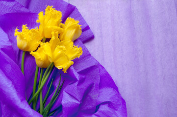 postcard with yellow flowers on violet paper