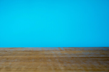 wooden table and blue wall
