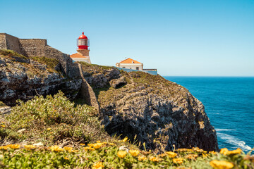 Fototapeta na wymiar Lighthouse at the end of Saint Vincent Cape, Portugal