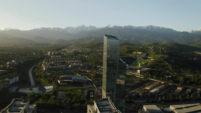 Aerial view of Esentai Tower Business Centre at sunrise. Almaty, Kazakhstan.
